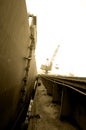 Crane Working on Sunny Background, Ship Rope ladder with Wooden Boards - Sepia