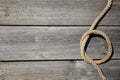 Ship rope on old wooden texture background with copy space Royalty Free Stock Photo