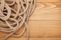 Ship rope on old wooden texture background Royalty Free Stock Photo