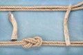 Ship rope on old wooden texture background Royalty Free Stock Photo