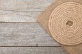 Ship rope on wood and burlap Royalty Free Stock Photo