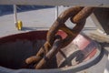 Ship rusty anchor chain on a winch