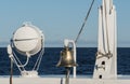 The ship`s bell and the searchlight of the ship. Royalty Free Stock Photo