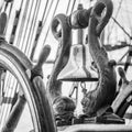 Ship`s Bell and wheel the old sailboat