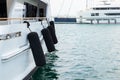 Ship`s bow and aquamarine water in the port of Syracuse, Sicily. Boat and sea, detail. Sailing vessel drops anchor Royalty Free Stock Photo