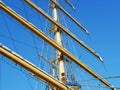 The ship`s rope hangs on the mast of a sailing ship.  A Bay of nylon rope on the deck of a sailboat. Royalty Free Stock Photo