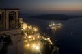 Ship sailing away from Santorini at night Royalty Free Stock Photo