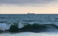 Ship sailing for the horizon in stormy weather