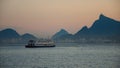 Ship sailing in the ocean at Guanabara Bay, Rio de Janeiro during the sunset Royalty Free Stock Photo