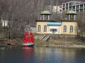 Ship with scarlet sails on the lake spring forest. Russia, Saratov - april,2014
