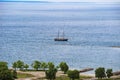 Beautiful seascape. Lone ship floats at the blue sea. Royalty Free Stock Photo