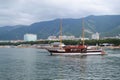 Ship at sea, ship against the background of the sea and mountains, pleasure ship.