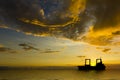 Ship Silhouette with Stormy Clouds at Sunset Royalty Free Stock Photo