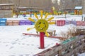 Ship steering wheel shape made from old car tire and empty plastic bottles. Installed on a children`s playground. Russia