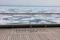 Ship stern of the MS Hanseatic Spirit with ice floes in the background.