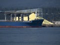Ship beside sulfur pile in Vancouver BC