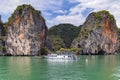 Ship with tourists near famous place in Phang Nga bay near James Bond island, Phuket. Royalty Free Stock Photo