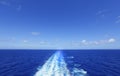 Ship wake in blue ocean