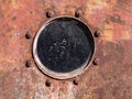 Ship window with rusty bolts Royalty Free Stock Photo