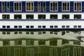 Ship windows with their reflections in water. Royalty Free Stock Photo