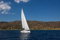 Ship yachts with white sails in the open Sea. Royalty Free Stock Photo