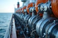 Shipboard machinery shows powerful marine diesel engine. Complex equipment, pipelines, systems presented. Background horizon of Royalty Free Stock Photo