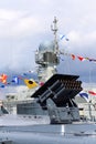 Shipboard multiple launch rocket launcher system on the deck of a ship