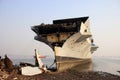 Shipbreaking Yard in Darukhana, Mumbai, India Ã¢â¬â INS Vikrant dismantling with scrap metal & workers in background Royalty Free Stock Photo