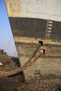 Shipbreaking Yard in Darukhana, Mumbai, India Ã¢â¬â INS Vikrant dismantling with scrap metal & workers in background