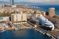 Shipbuilding. Unfinished large ships during construction surrounded by scaffold on dry dock in shipyard at the port of Barcelona