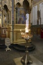 Paschal candle burns in front of Iconostasis