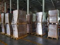 Shipment cartons box on pallets and wooden case on forklift in interior warehouse cargo for export and sorting goods in freight lo