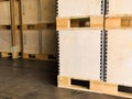 Shipment cartons box on pallets and wooden case on forklift in interior warehouse cargo for export and sorting goods in freight