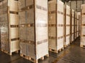 Shipment cartons box on pallets and wooden case on forklift in interior warehouse cargo for export and sorting goods in freight