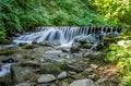 Shipot waterfall on a mountain river among stones and rocks in the Ukrainian Carpathians Royalty Free Stock Photo