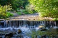 Shipot waterfall on a mountain river among stones and rocks in the Ukrainian Carpathians Royalty Free Stock Photo