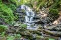 Shipot waterfall on a mountain river among stones and rocks in the Ukrainian Carpathians Royalty Free Stock Photo