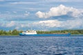 Shipping boat floating on river or lake calm view Royalty Free Stock Photo