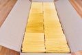 Shipping Box Filled with Yellow Bubble Mailers Royalty Free Stock Photo