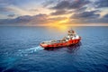 Shipping box is loaded from an offshore rig to the supply vessel Royalty Free Stock Photo