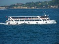 Shipping concept. Ferry with tourists sailing by sea. Traveling by ferry. Sea transport