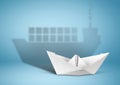 Shipping concept, paper boat with container ship shadow