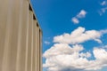 Shipping container close up and blue sky and white clouds Royalty Free Stock Photo