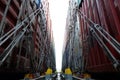 Shipping container lashing onboard. Royalty Free Stock Photo