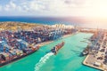 Shipping container ship in import export and business, aerial top view