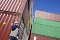 Shipping containers and dock worker