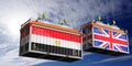 Shipping containers with flags of Egypt and United Kingdom