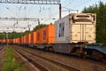 Shipping containers of ZIH Zhengzhou International Hub transportation on cargo train by railway. China-Europe freight trains.