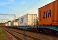 Shipping containers of ZIH Zhengzhou International Hub transportation on cargo train by railway. China-Europe freight trains. Royalty Free Stock Photo