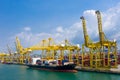 Shipping port and shipping containers with crane Royalty Free Stock Photo